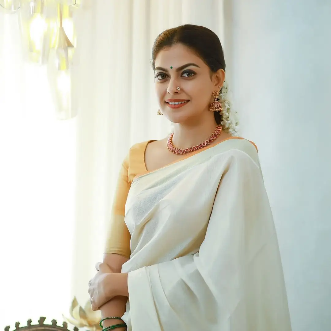 Malayalam Actress Anusree Nair in White Saree Yellow Blouse